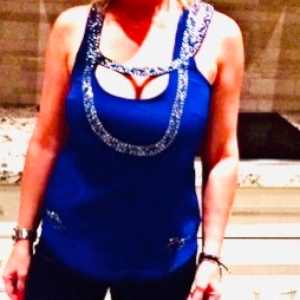 Gorgeous Madison Marcus blue top.